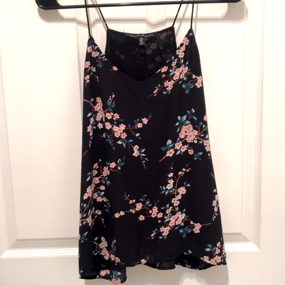 Black spaghetti strap with floral details. Size S
